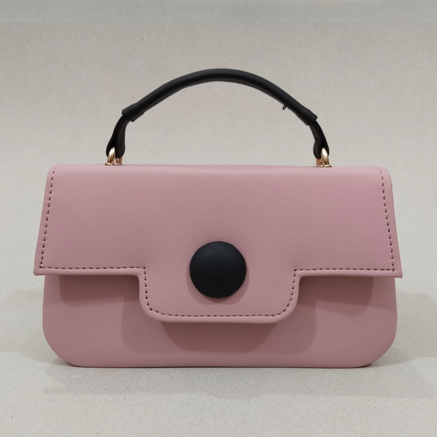 Elegant Women’s Flap Handbag with Top Handle and Secure Button Closure