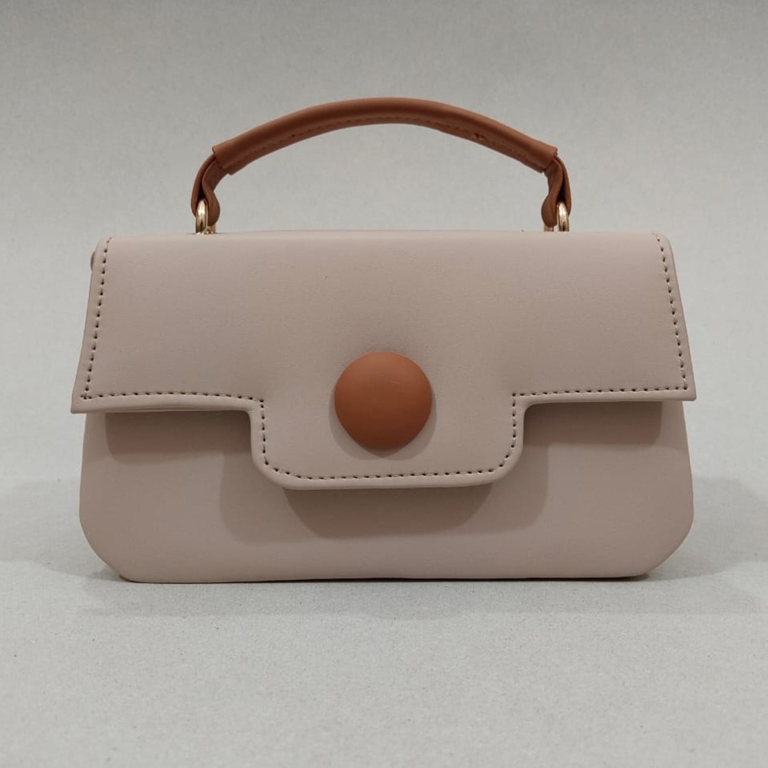 Elegant Women’s Flap Handbag with Top Handle and Secure Button Closure