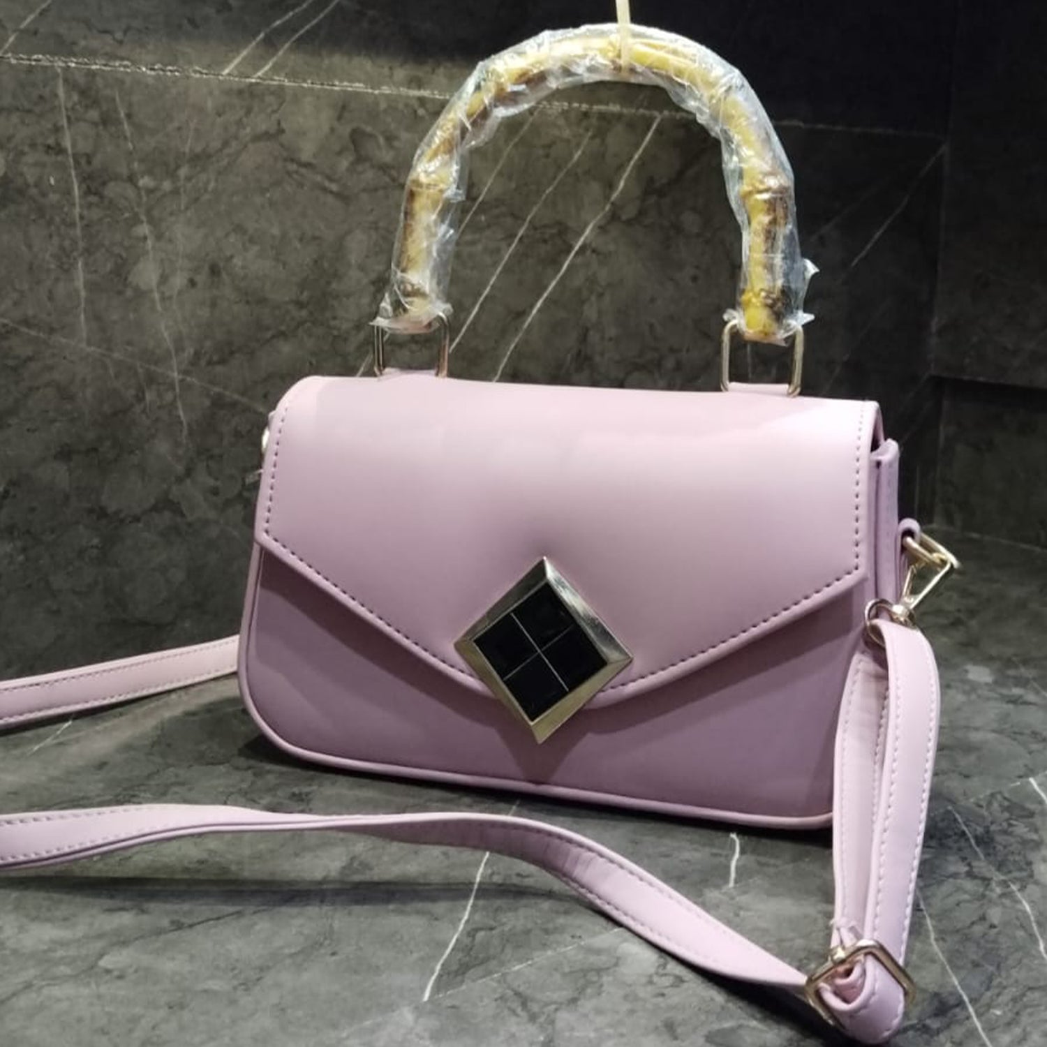 Women’s Crossbody Handbag with Top Handle and Geometric Lock Design