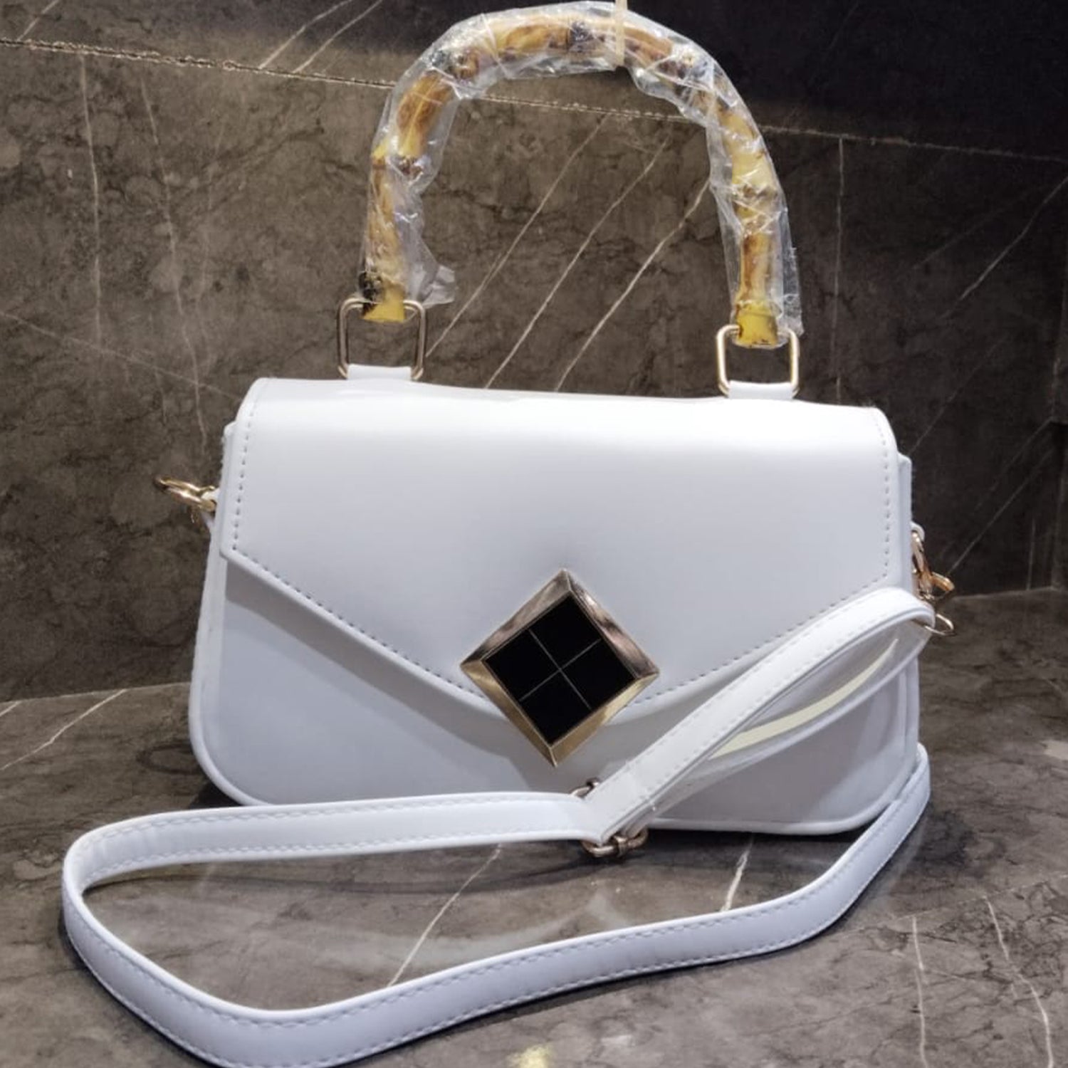 Women’s Crossbody Handbag with Top Handle and Geometric Lock Design